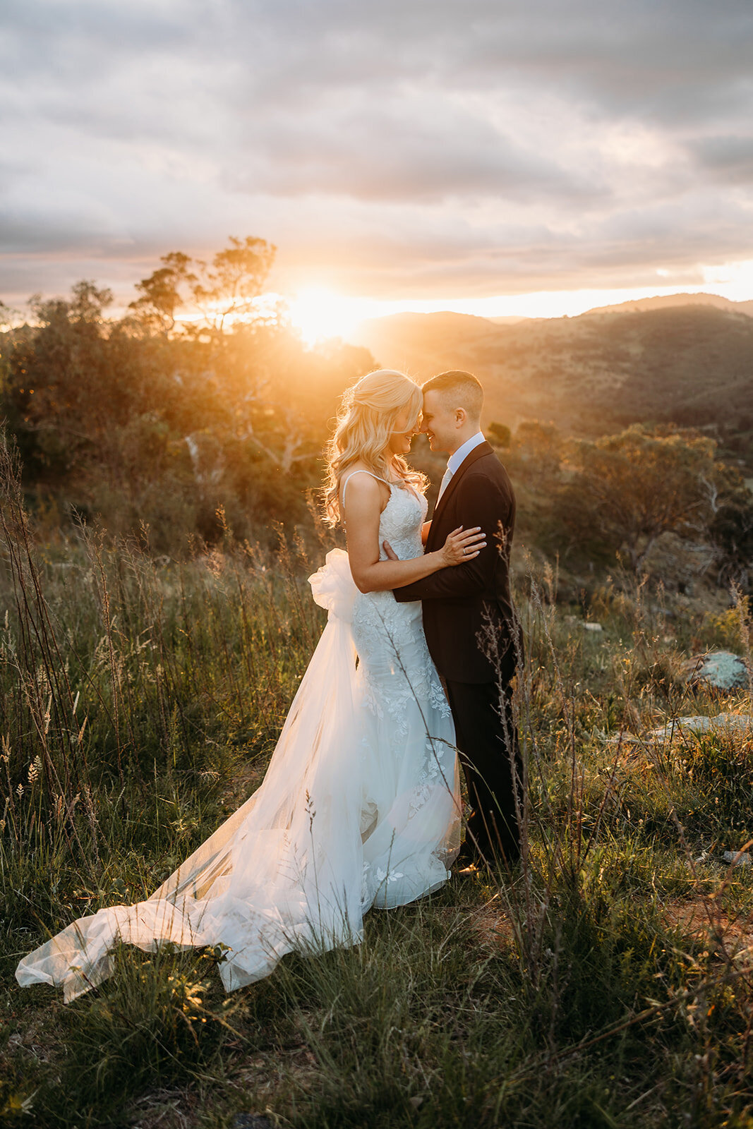 Sunset portraits of a bride and groom at their wedding at Brindabella Hills Winery located in Wallaroo NSW near Canberra. Photo by Acacia & Grace Photography, a Canberra wedding photographer.