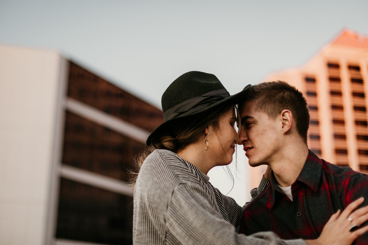 Couple looking at each other on a rooftop