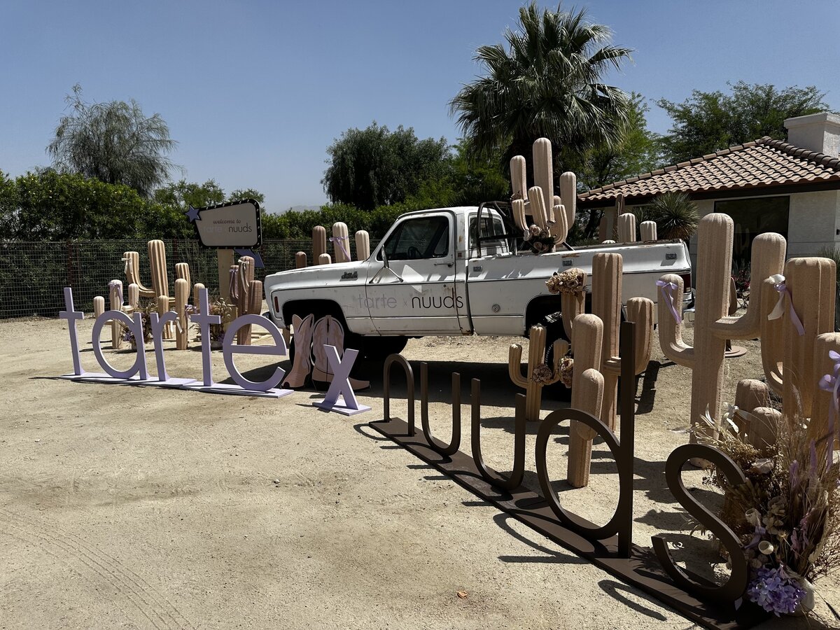 Tarte beauty activation by The Works Collective | custom poolside event installation in Palm Springs, California.
