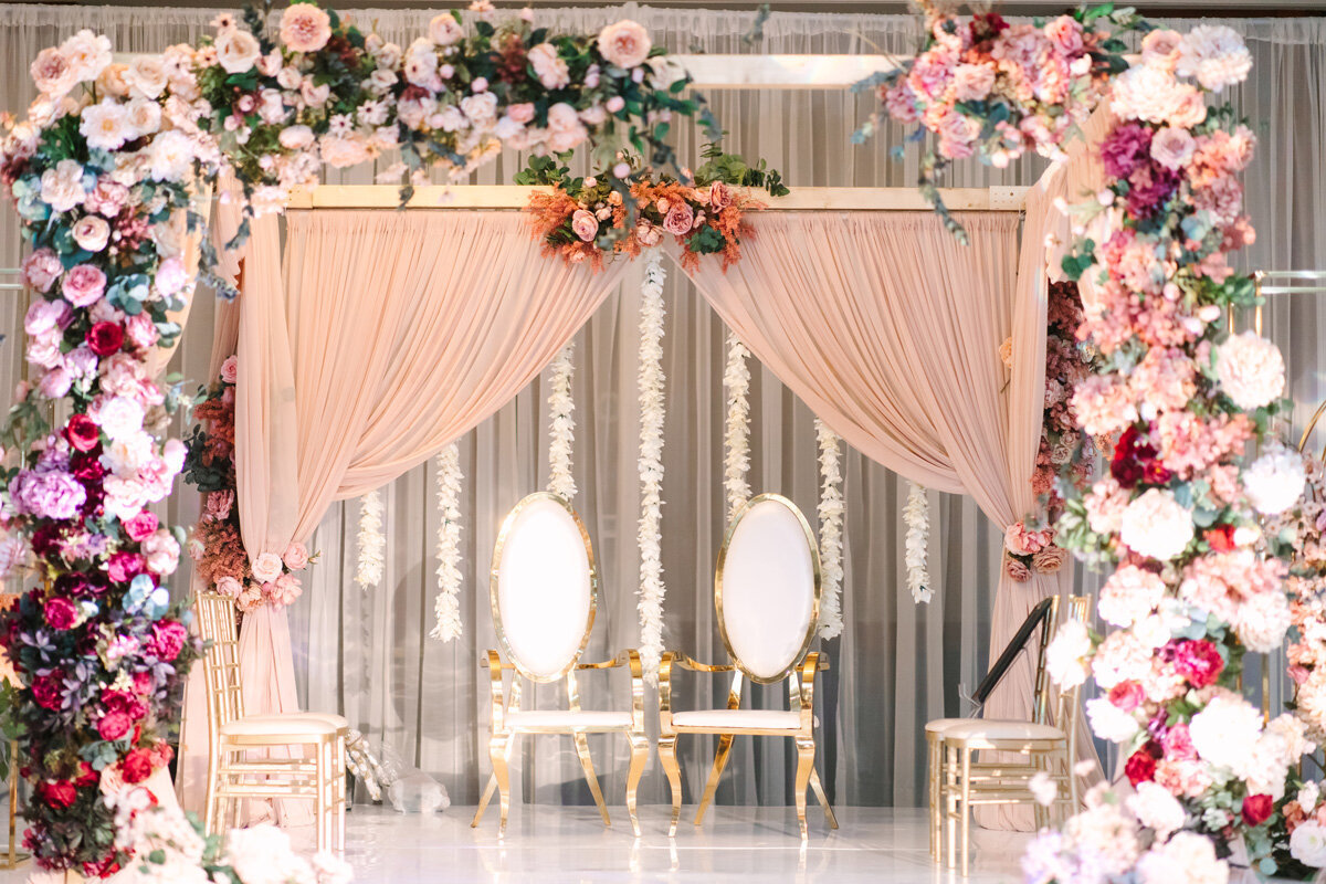 Pink, white and gold wedding ceremony decor.