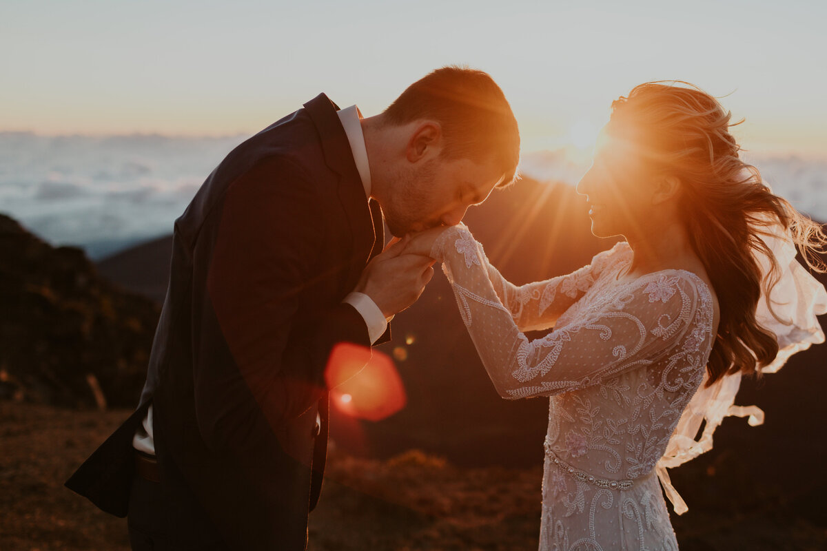 bride and groom on a boat in maui