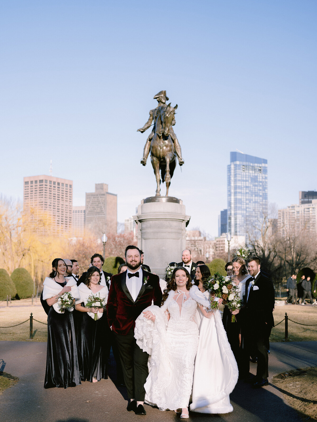 A wedding party in front of George Washington statue in the Boston Public Garden