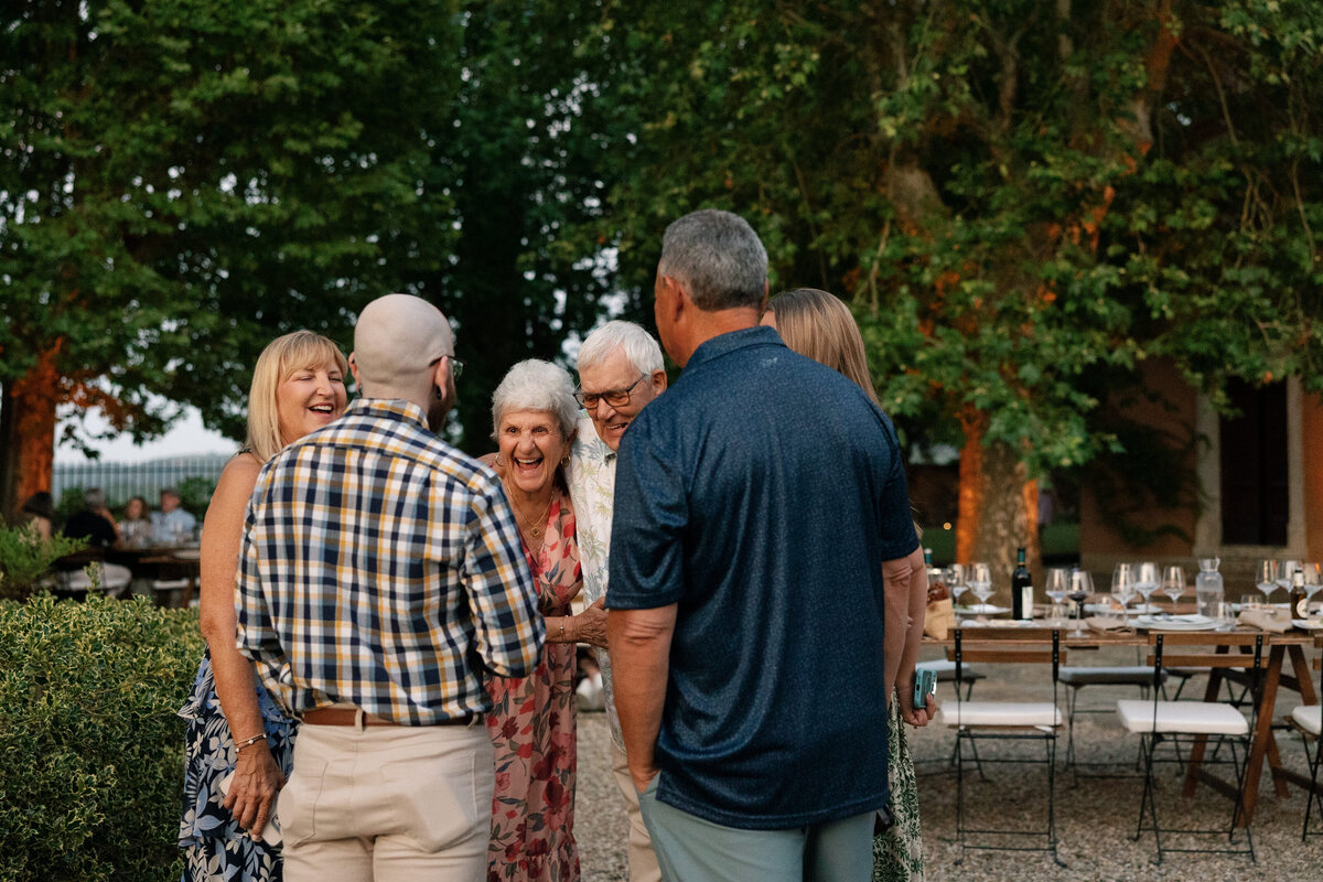 Capturing emotional speeches and quiet moments at the rehearsal dinner in Tuscany