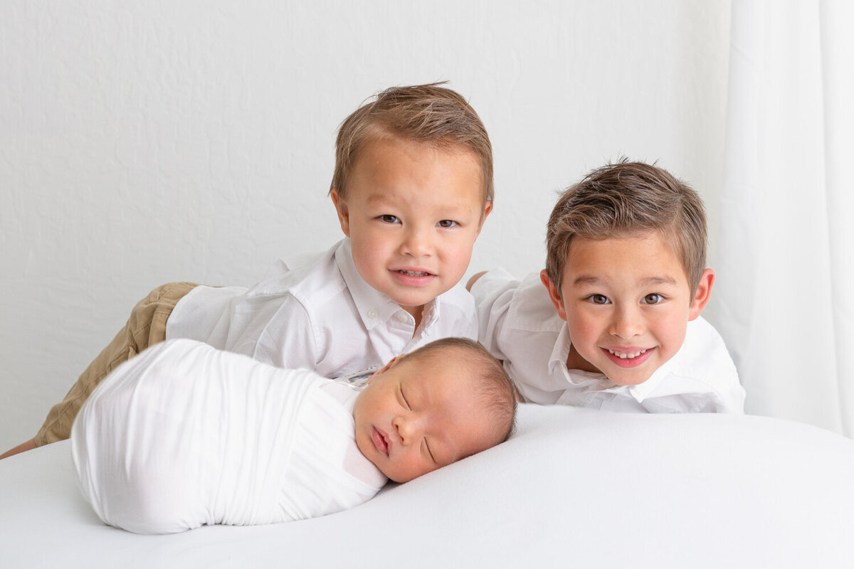 newborn with siblings