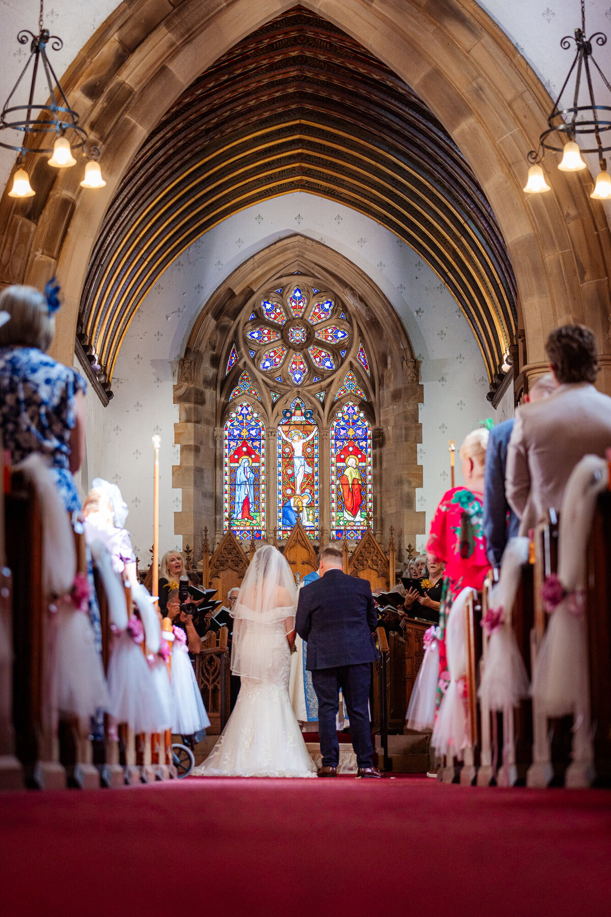 Couple during their  ceremony at Singleton Church picture taken by  Anthony Horseman Photography and Film