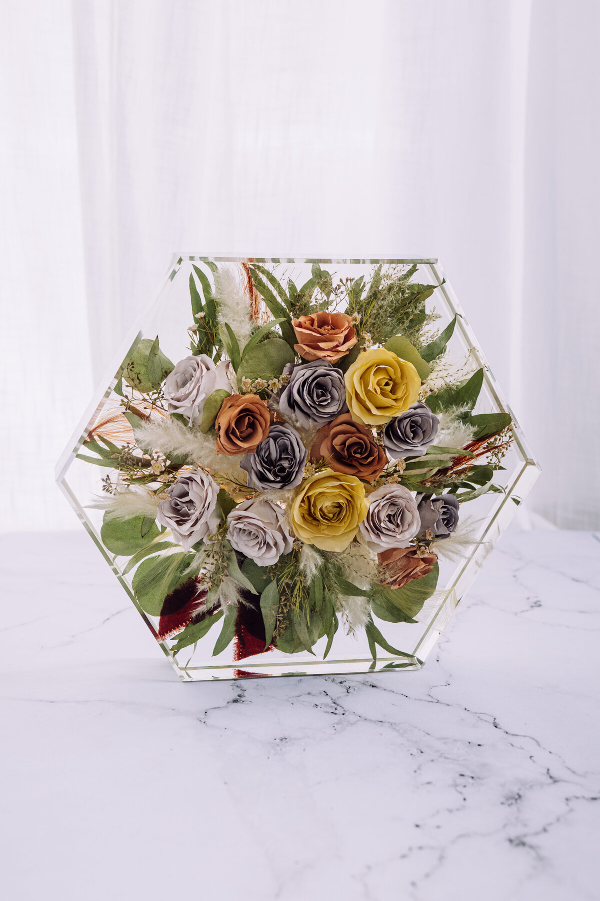 beautiful resin hexagon with wedding flowers