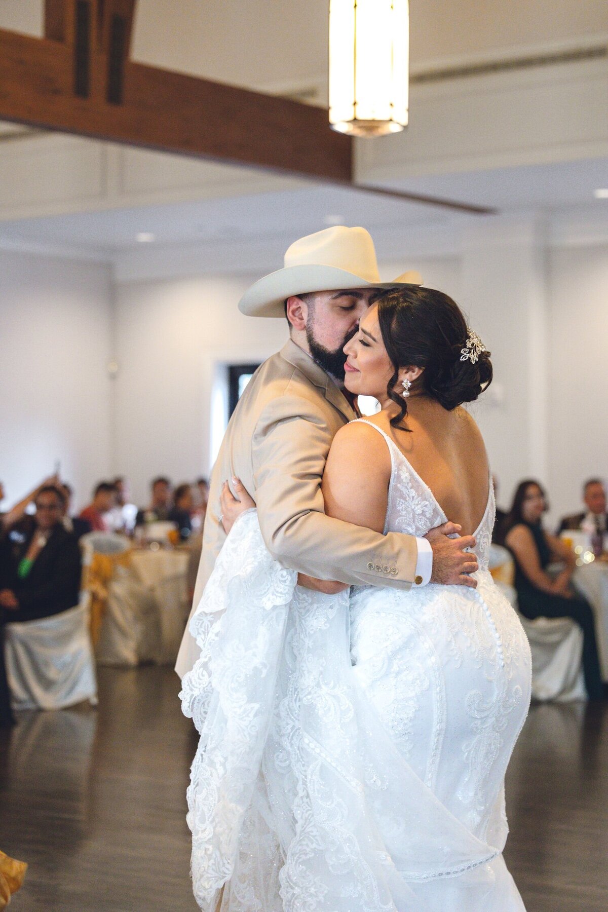 Bride and groom sharing first dance at Houston reception