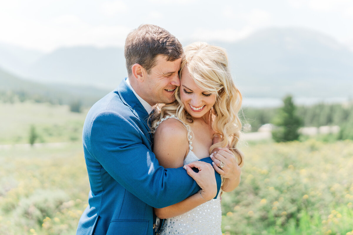 Lake Dillion Reservoir Colorado Elopement Wedding Mountain View Summer Pink and Orange Florals Sparkly Dress Light and Airy Elena Spraguer Photography0060