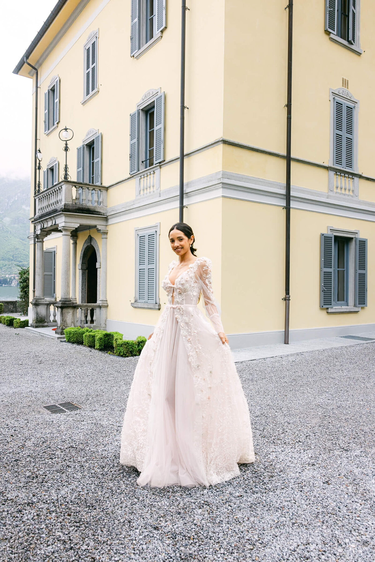 A wedding day bridal shot of a bride in her white dress at Villa Aura del Lago on lake como in Italy