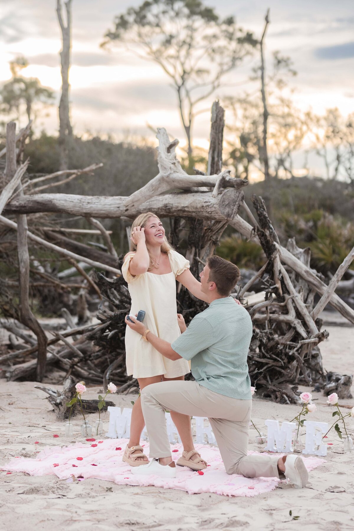 Surprise proposal photos at Boneyard Beach, Jacksonville, FL | Phavy Photography, Jacksonville Proposal Photographer