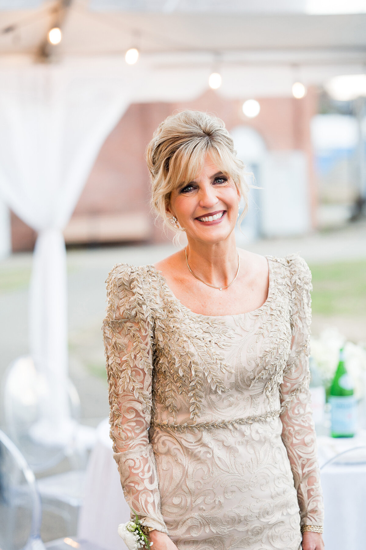 candid photo of brides mom on wedding day