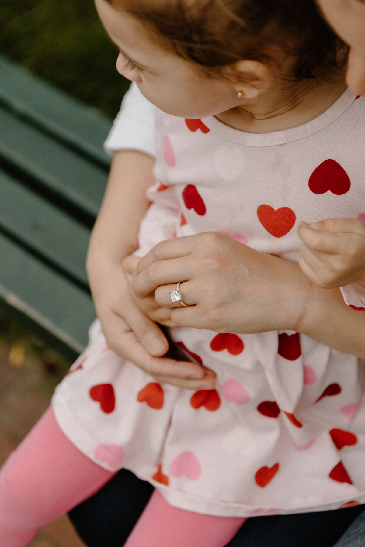 mom holding duaghter