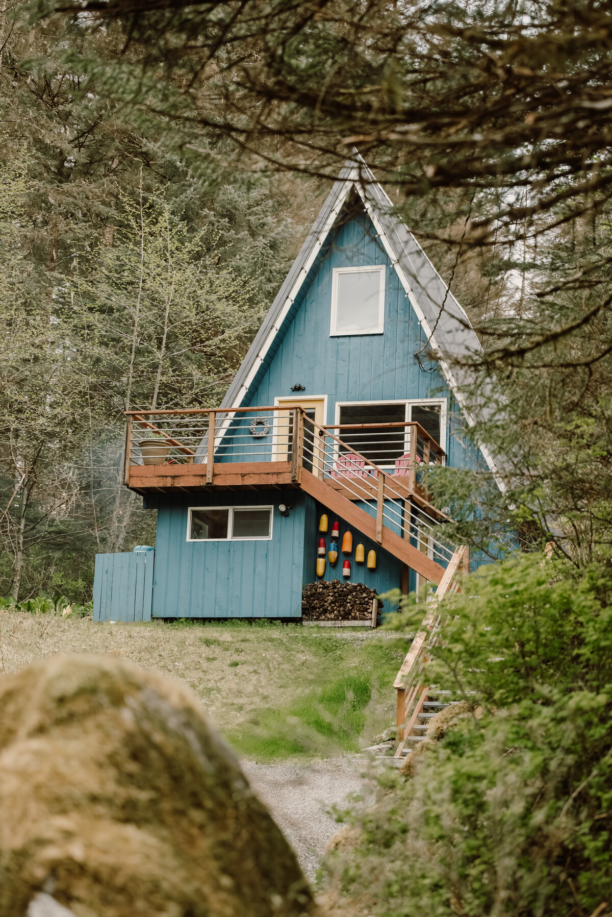 a-frame cabin sit in the forest