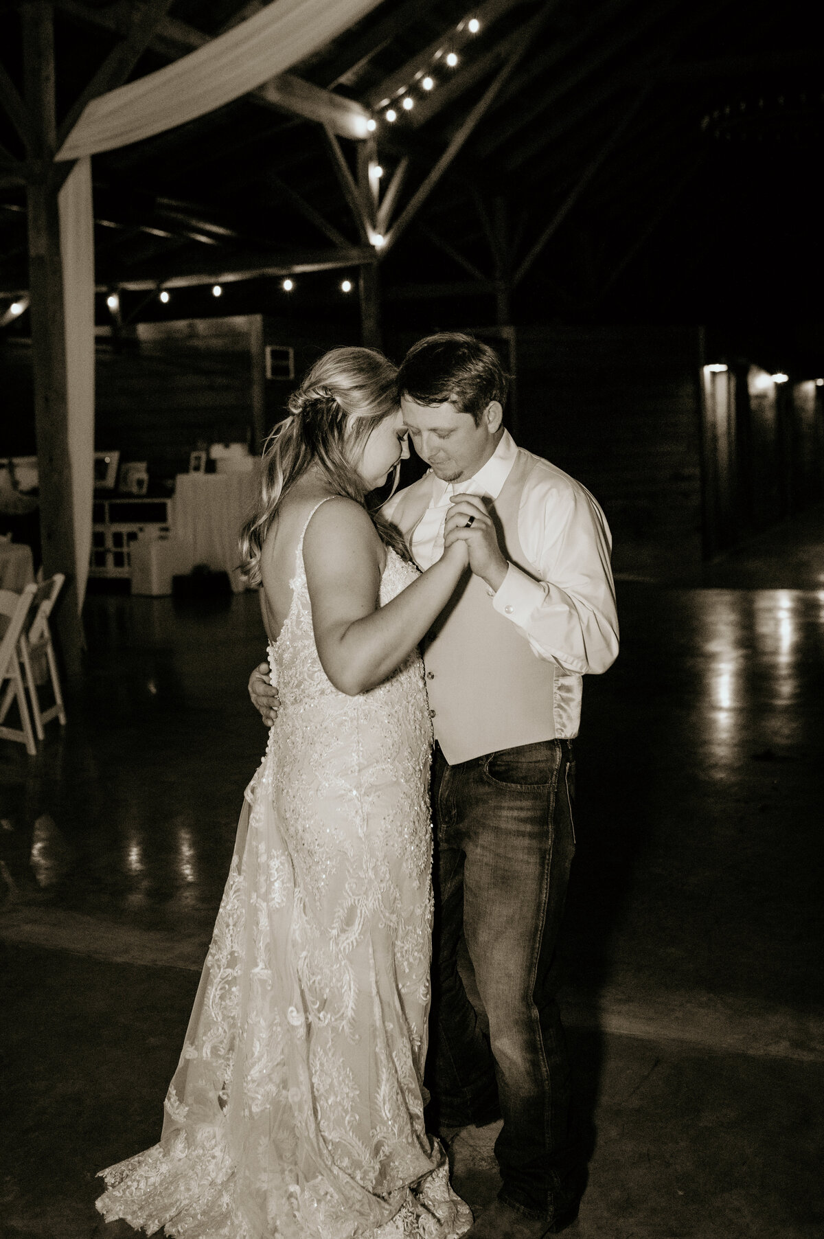 bride and grooms first dance as husband and wife in their little rock ar wedding venue
