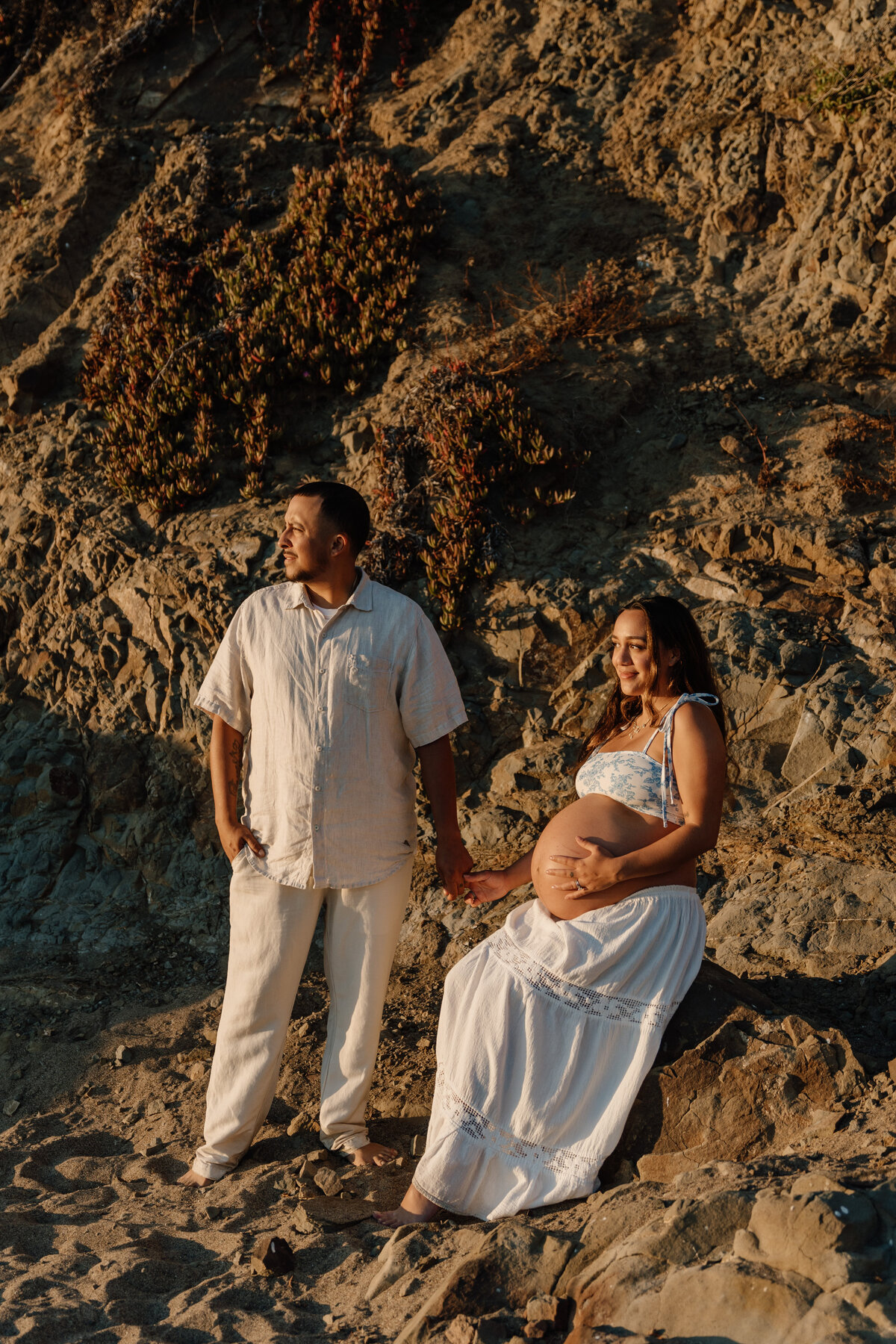 couple on beach in san francisco maternity