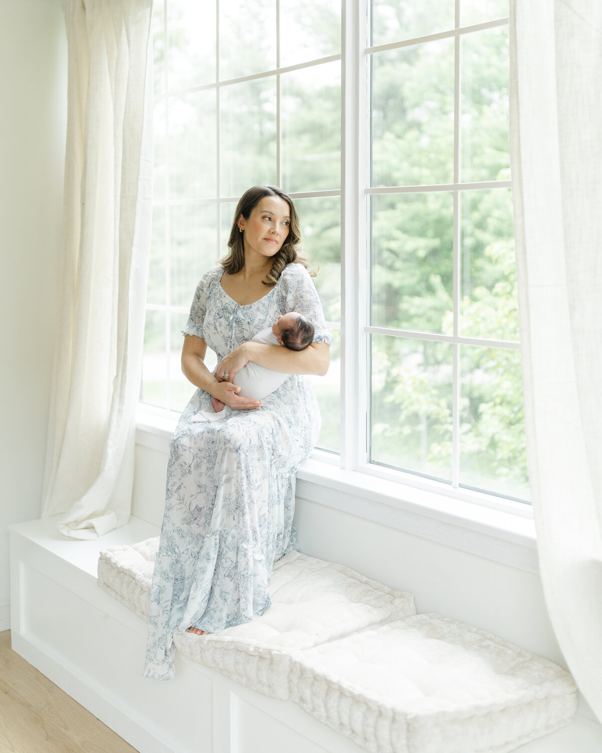 Newborn photography session with siblings at a Philadelphia photography studio - 11