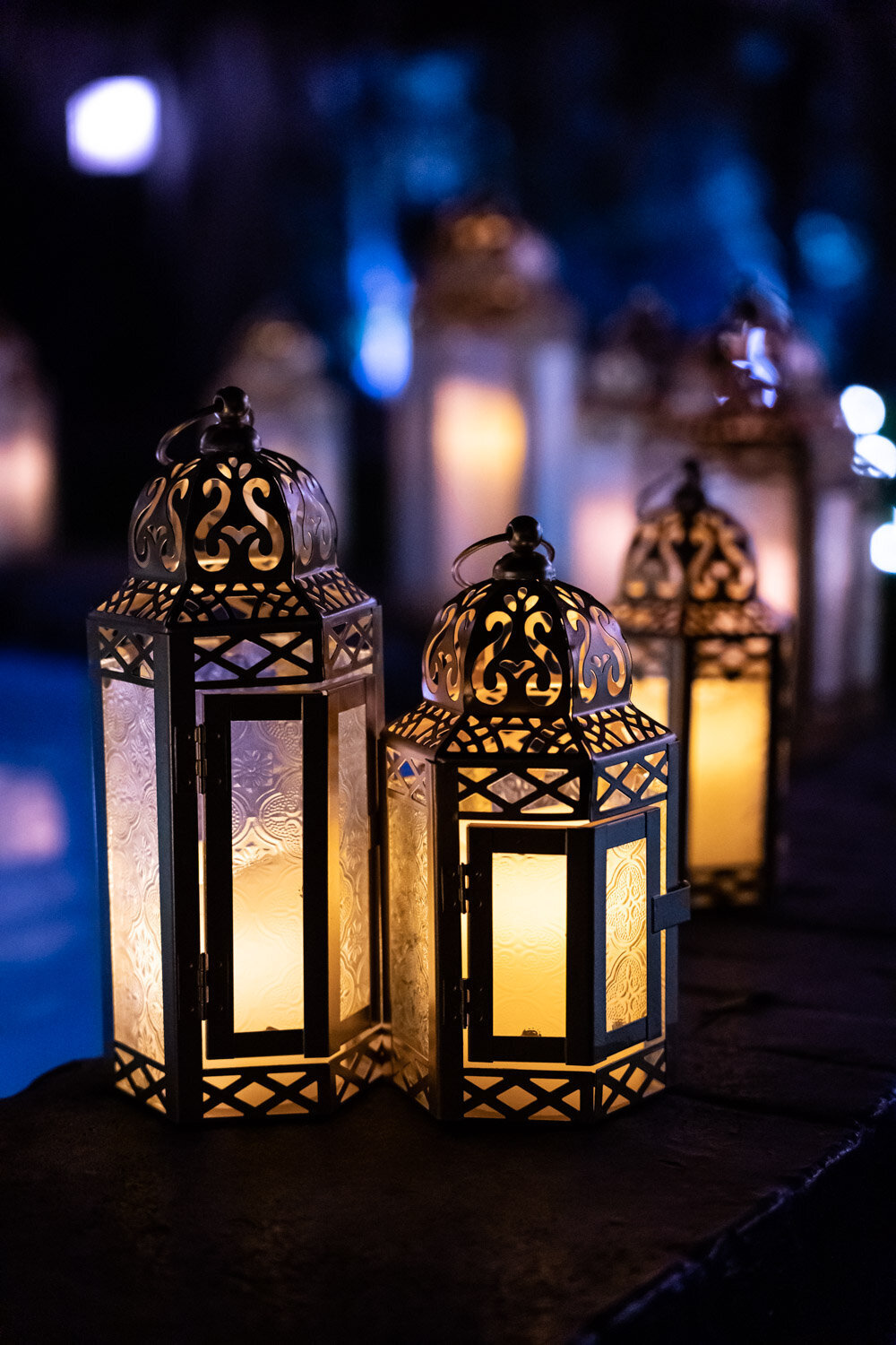 Close-up of lanterns around fountain