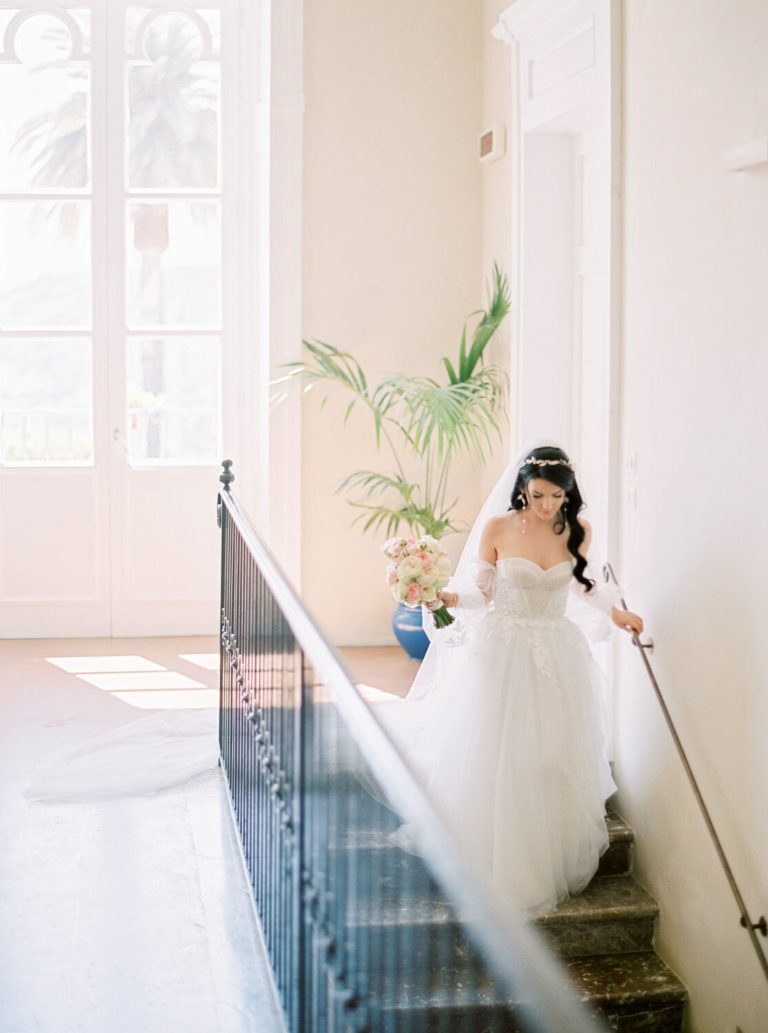 Villa Mon Repos bride walking down the stairs