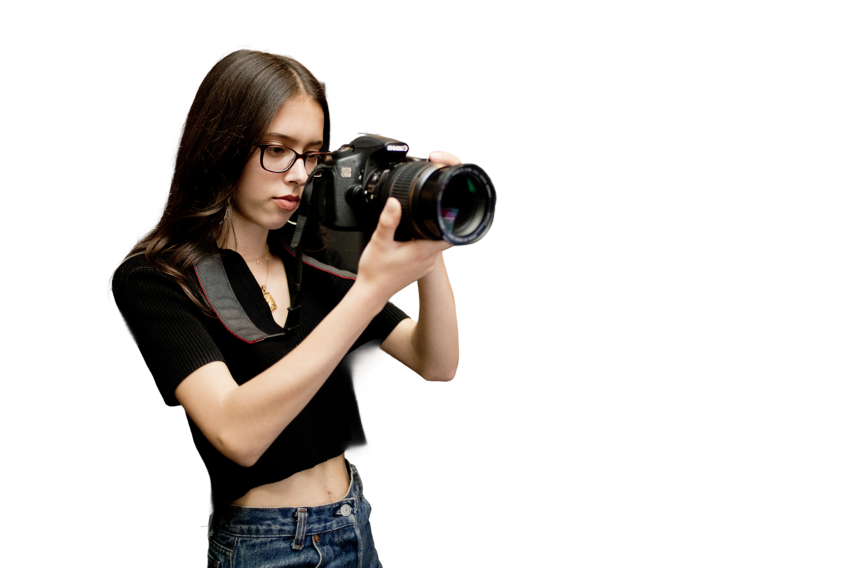 Young woman working a camera