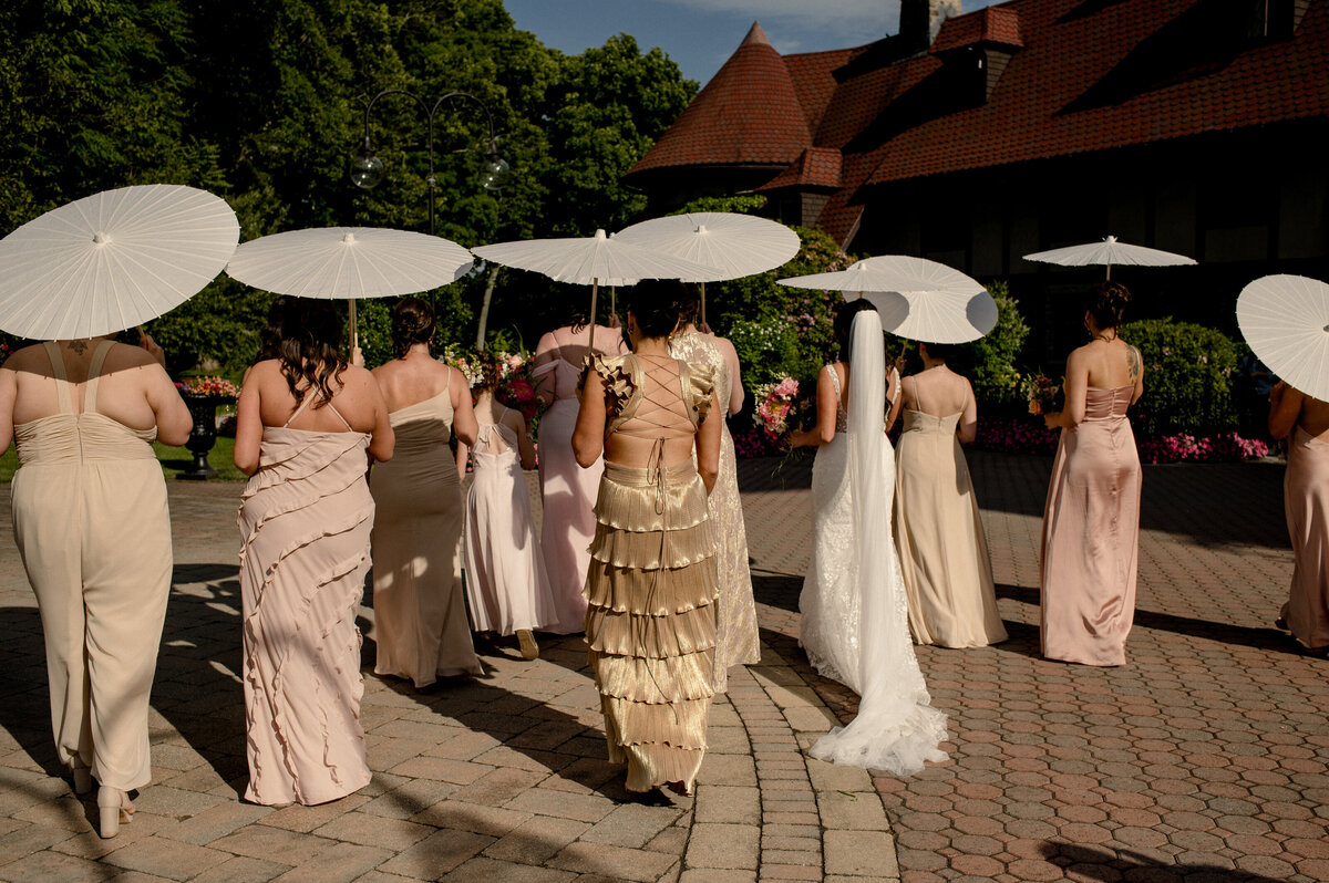 bride-and-bridesmaids-parasol-umbrellas-saint-clements-castle