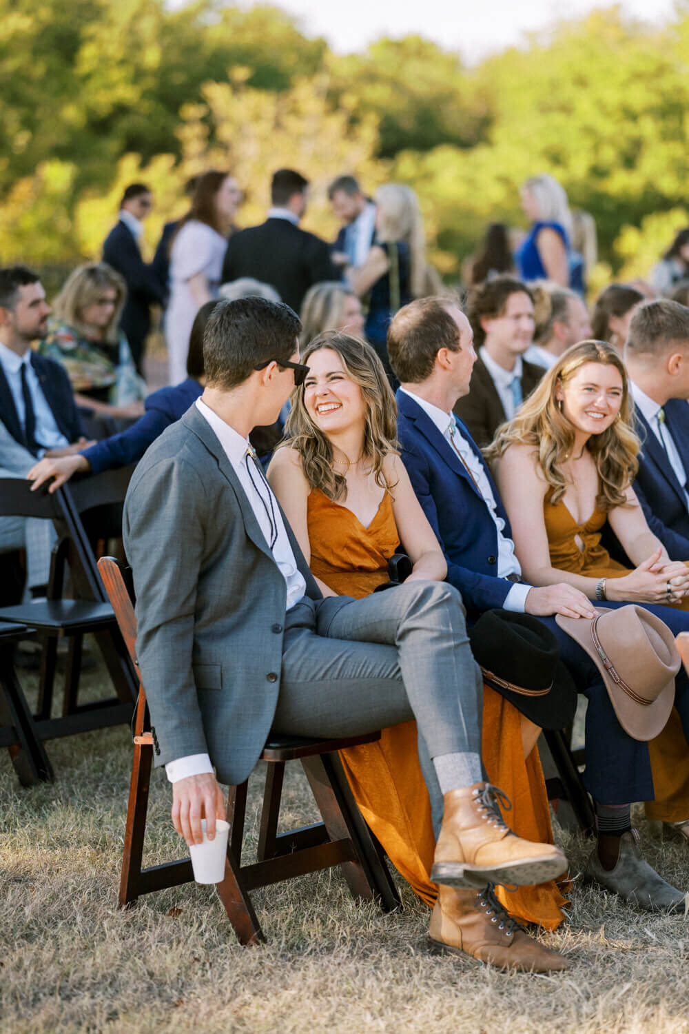 couple-laughing-together-waiting-for-ceremony