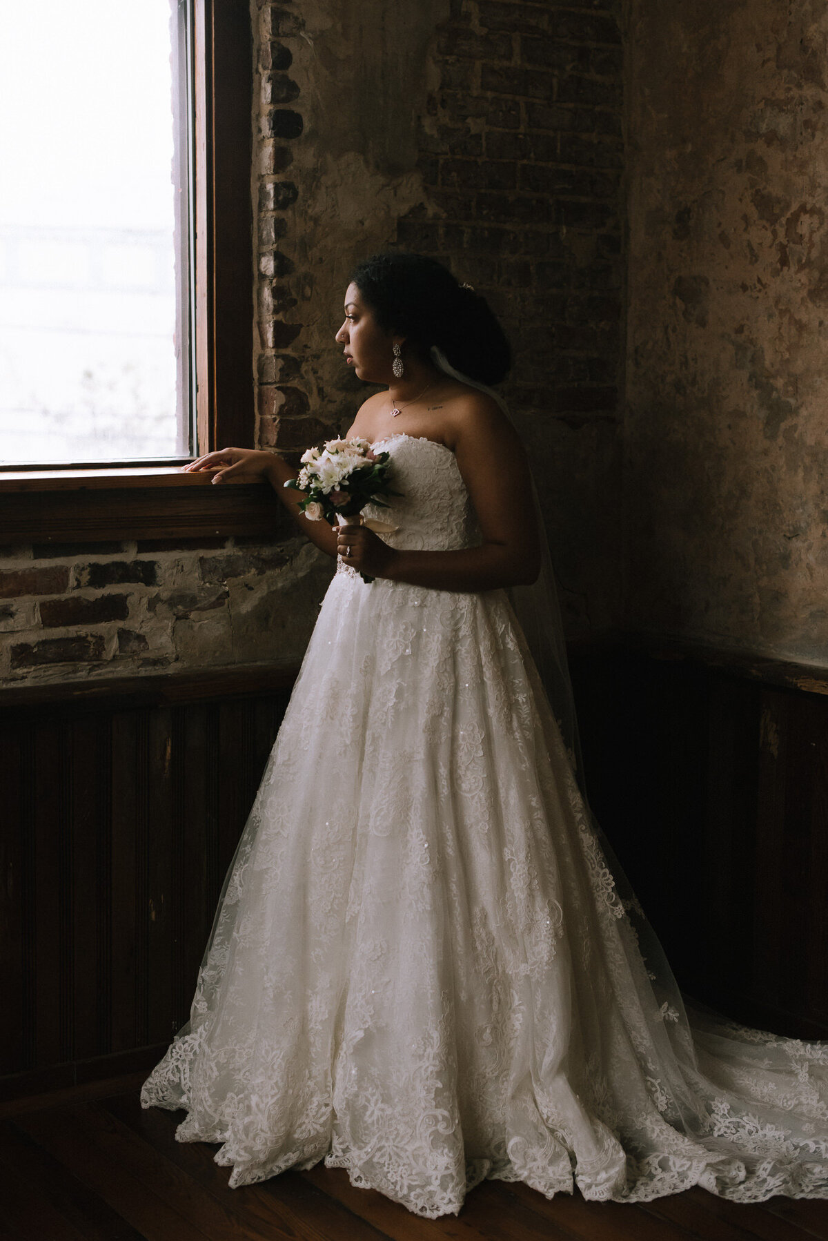 Bride Looking Out Window at The Annex 