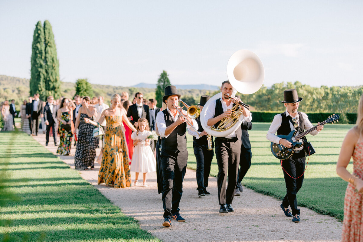 Guests and orchestra, outdoor wedding ceremony