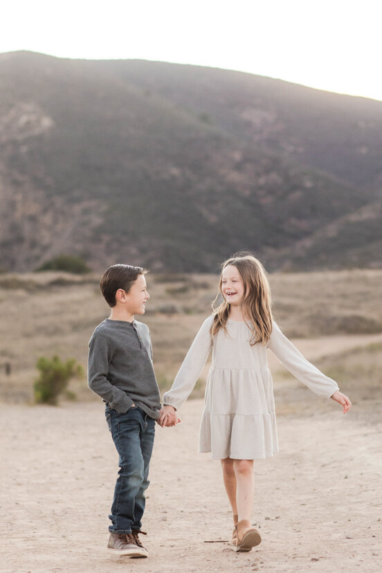 brother-and-sister-walking-at-mission-trails-san-diego