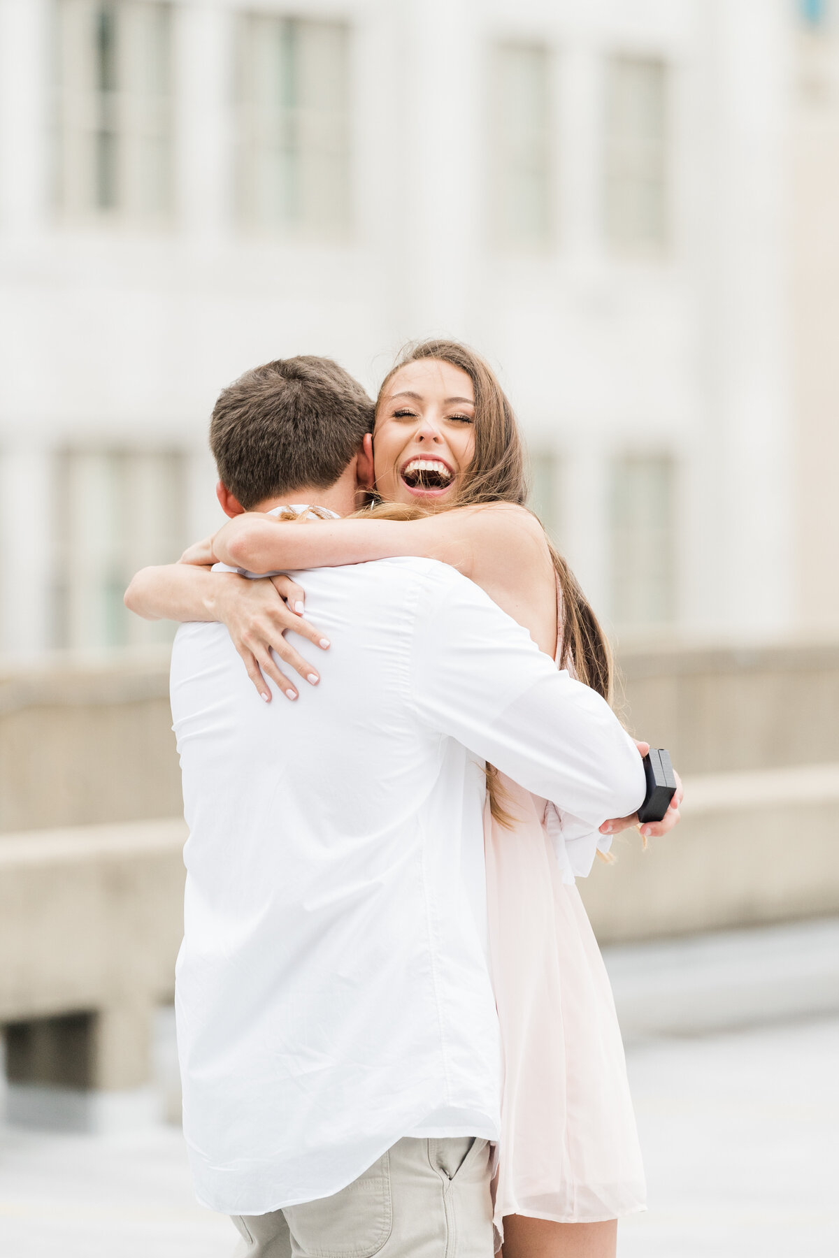 Engagement photoshoot on a rooftop in Alabama