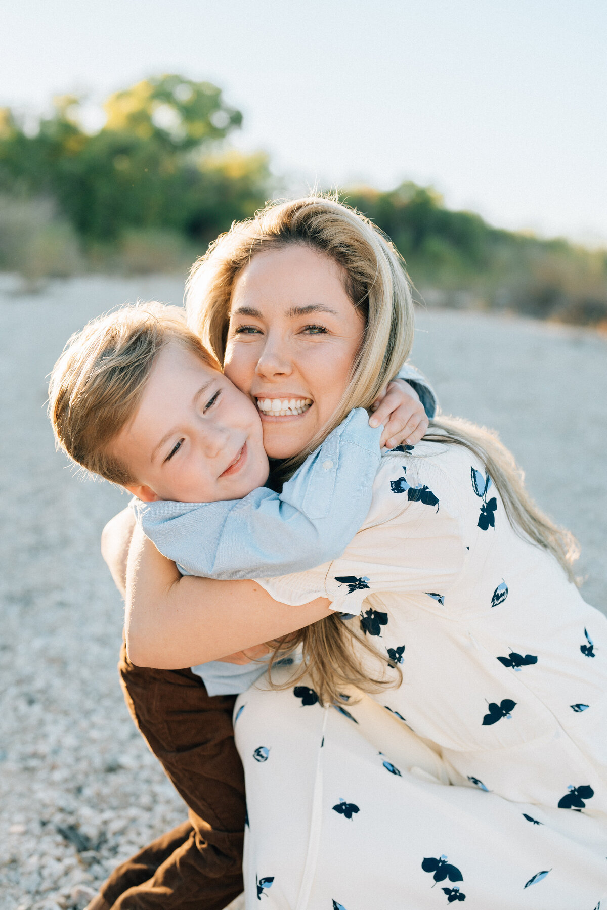 Mother and son hugging in a Tucson location