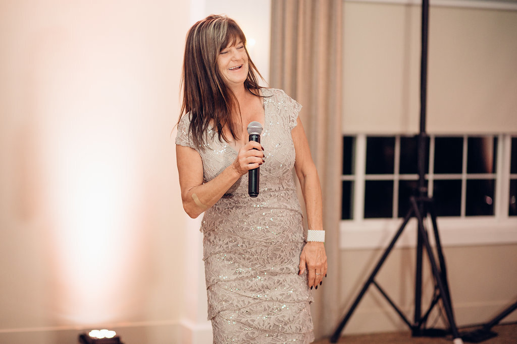 Wedding Photograph Of Woman In Light Brown Dress Laughing Los Angeles