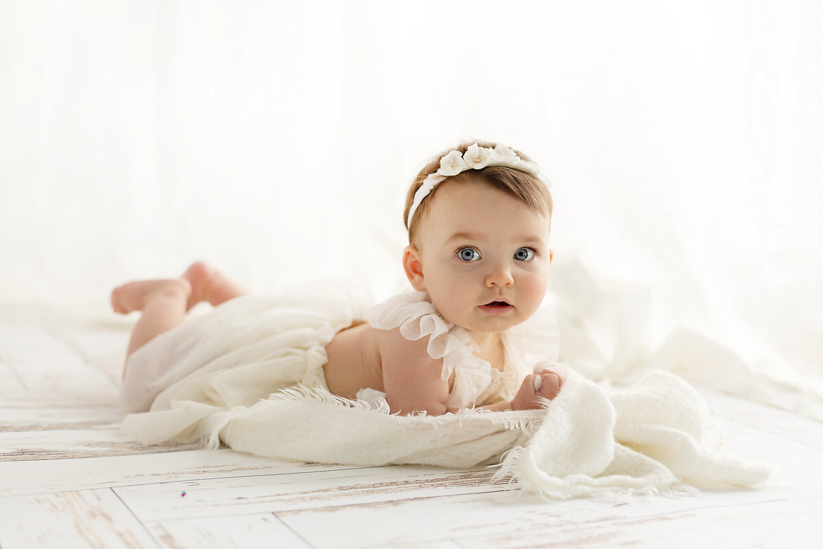 columbus-ohio-baby-photographer-studio-milestone-sitter-session-six-month-old-baby-girl-all-white-with blush-hilliard-dublin-marysville-dayton-springfield-photography-session-amanda-estep-photography