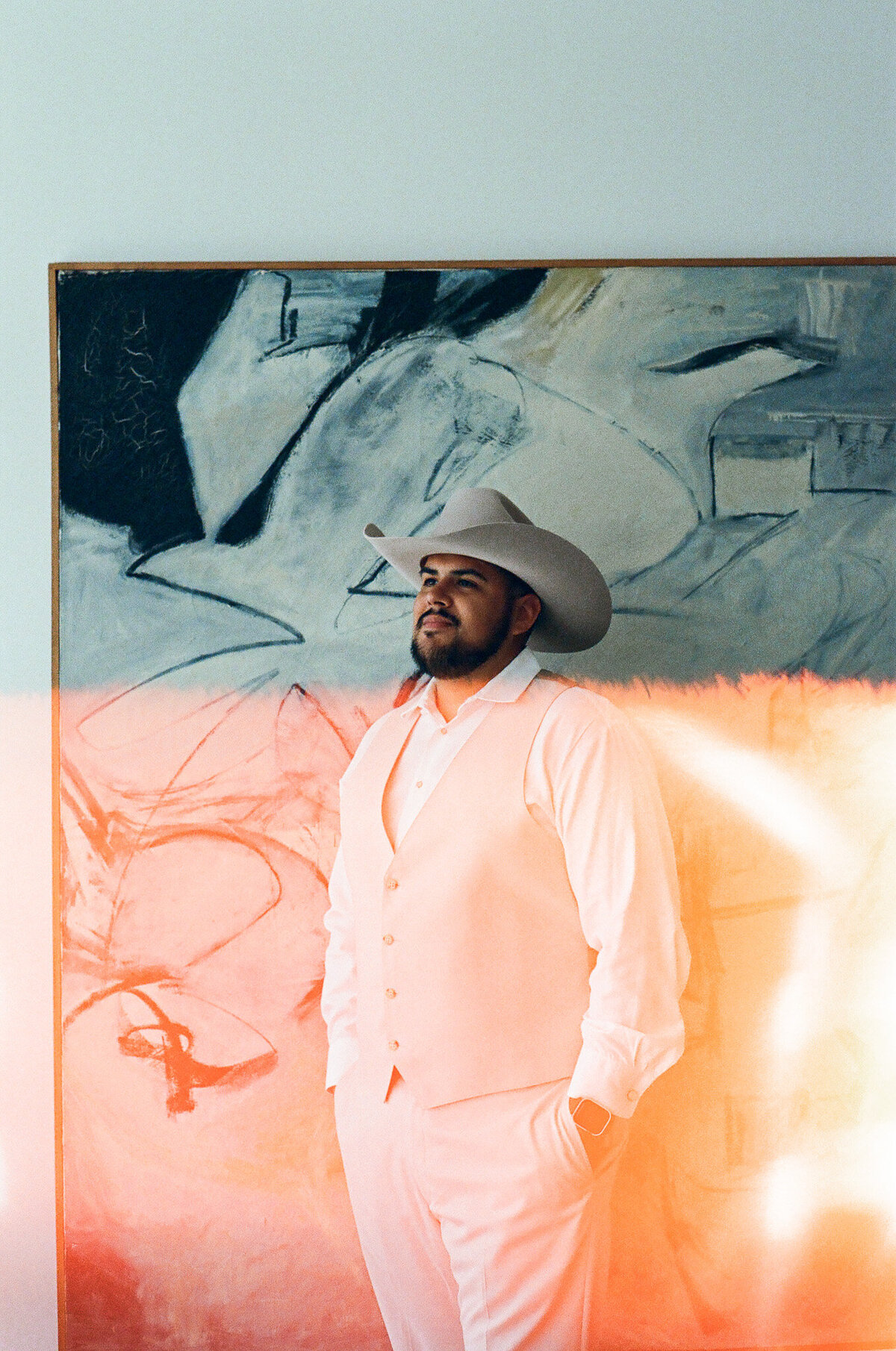 portrait of a groom captured on 35mm film by Texas and Los Angeles documentary wedding photographer
