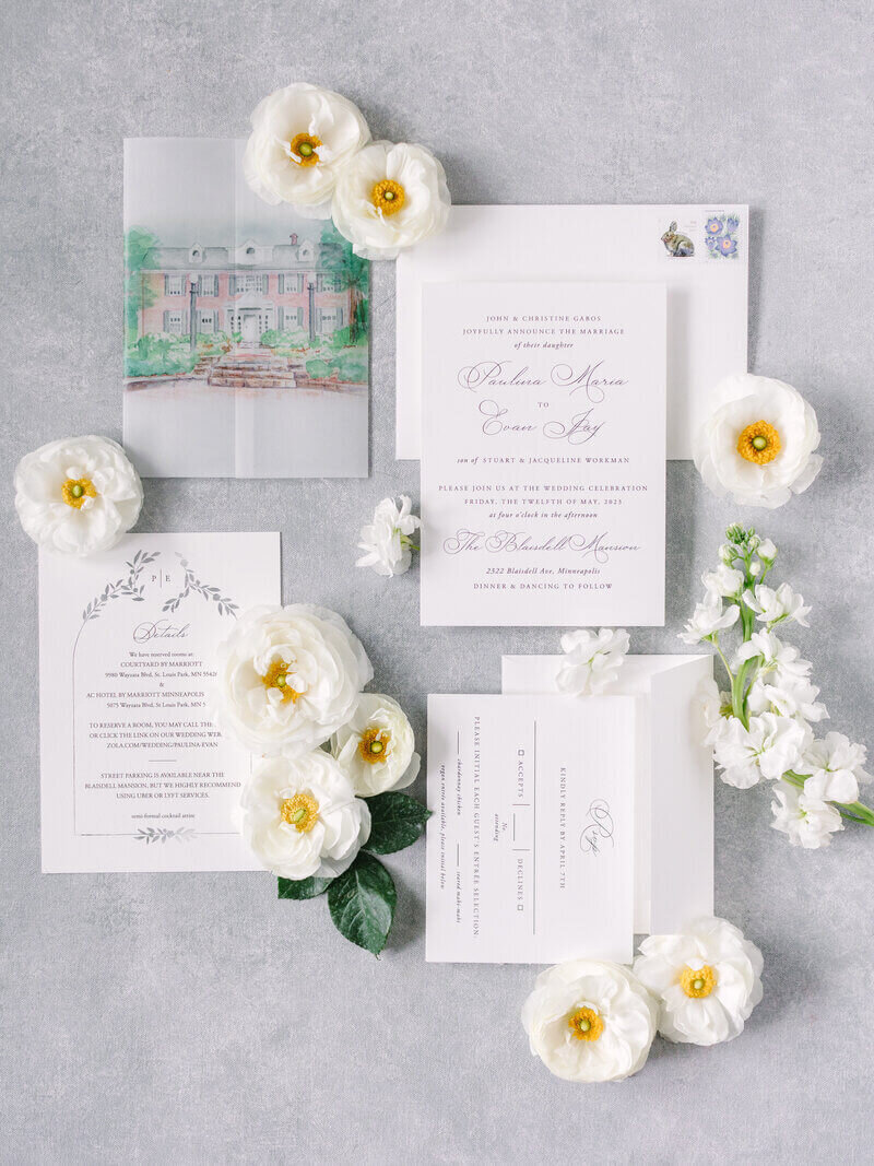 Invitation suite with flowers by luxury wedding planner chicago