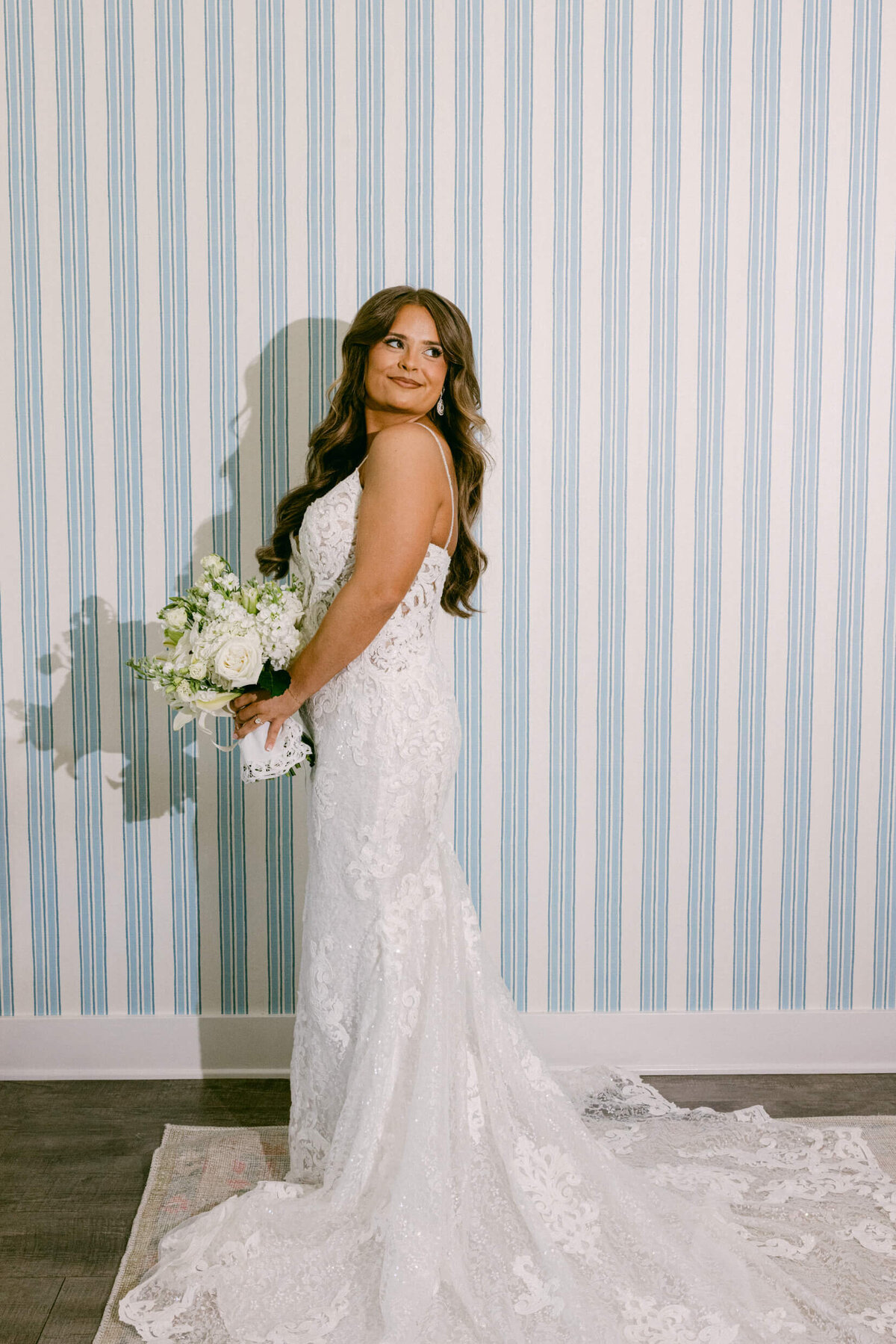 A wedding photo of a bride in her white wedding dress