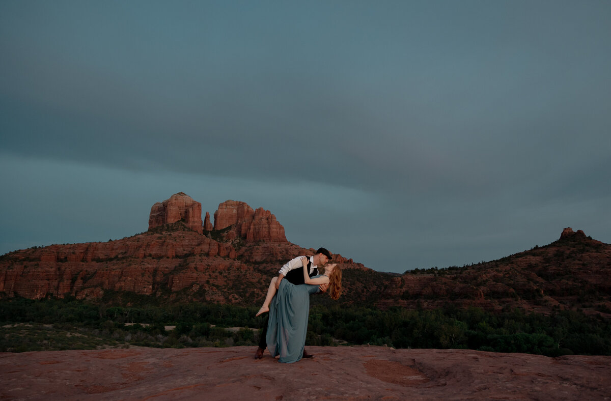 Sunset engagement photo in Sedona with golden Arizona light