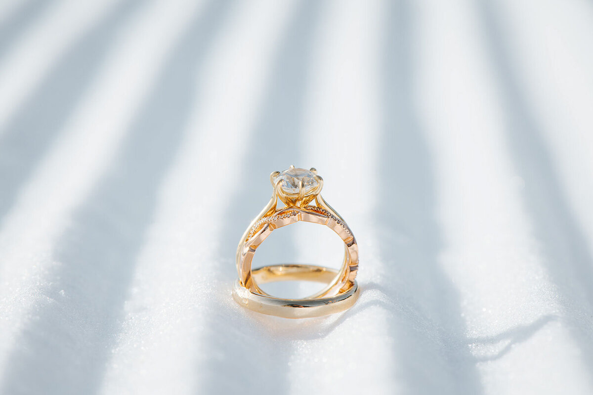 wedding and engagement ring on snow killington vermont wedding