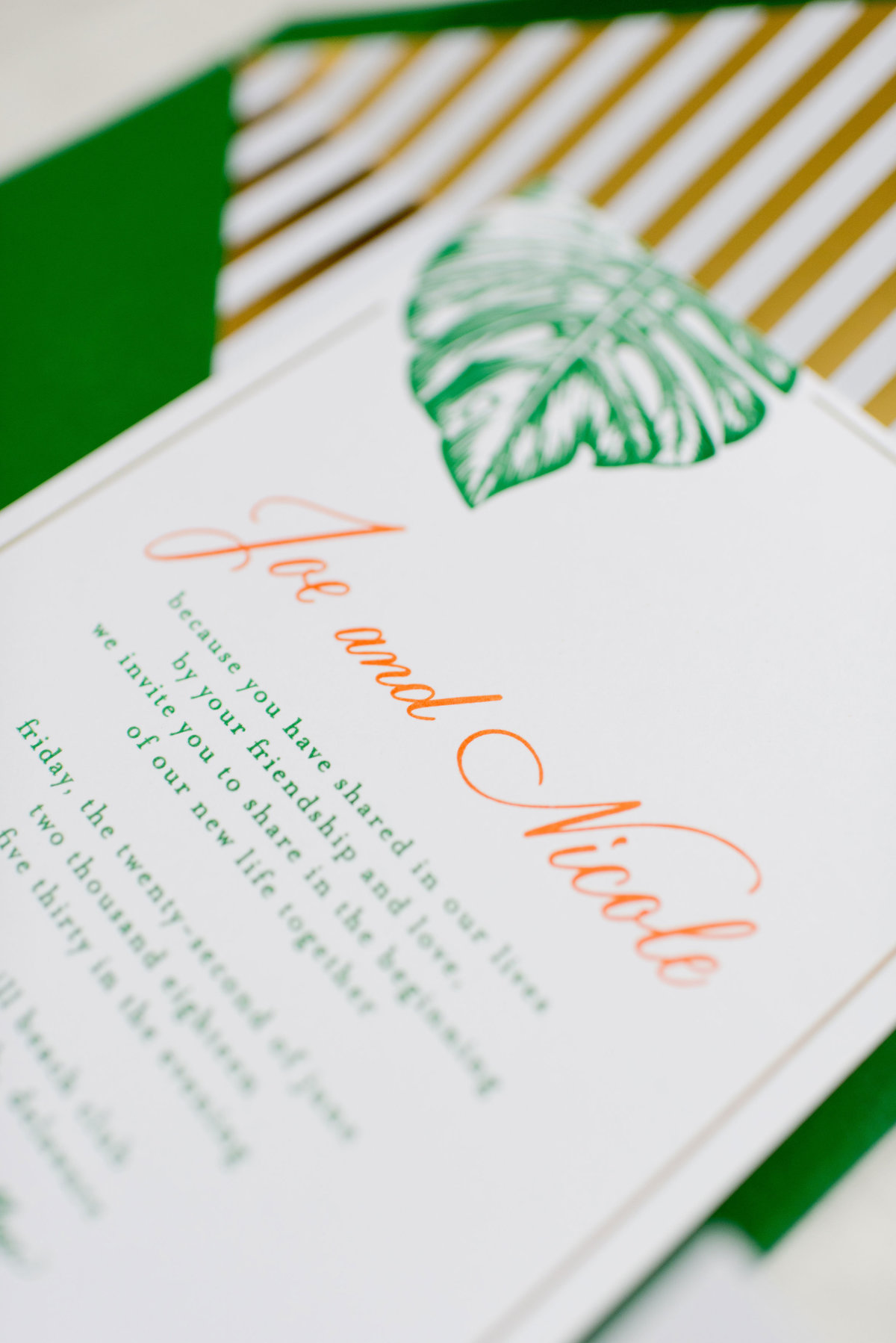 Monstera tropical hand lettered wedding invitations with envelope liner