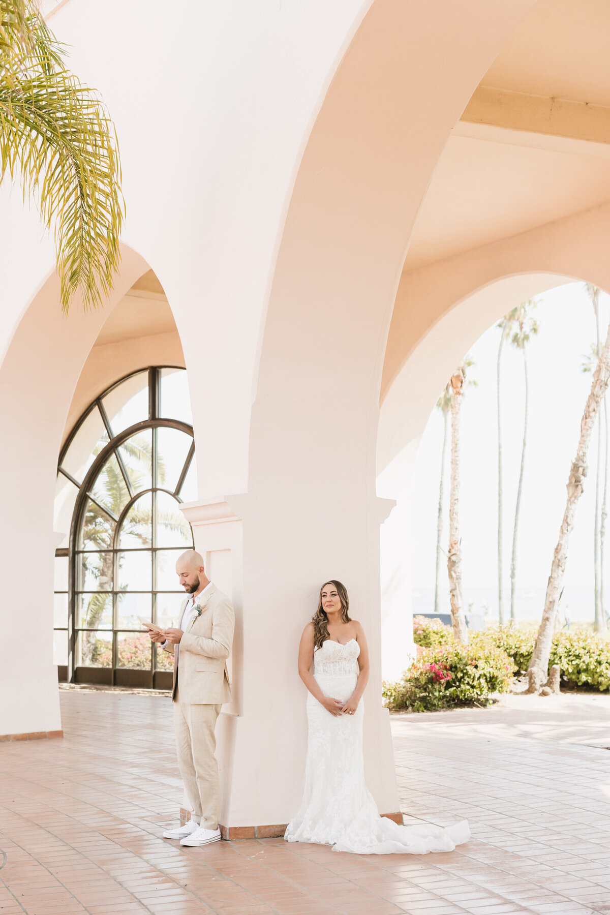 Bride and groom exchanging private vows at Hilton Beachfront Resort Santa Barbara