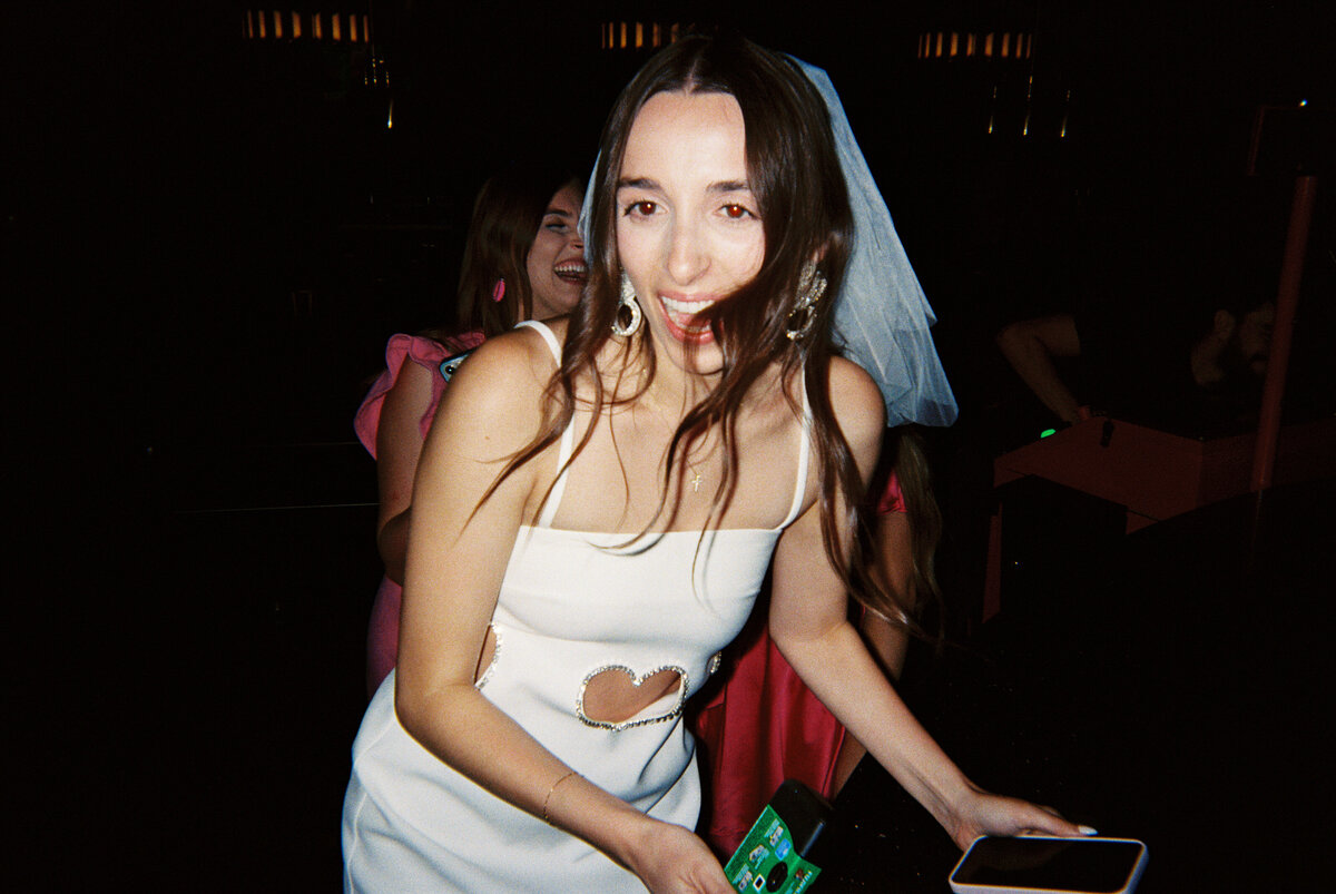 candid bride smiling in white dress and veil austin texas
