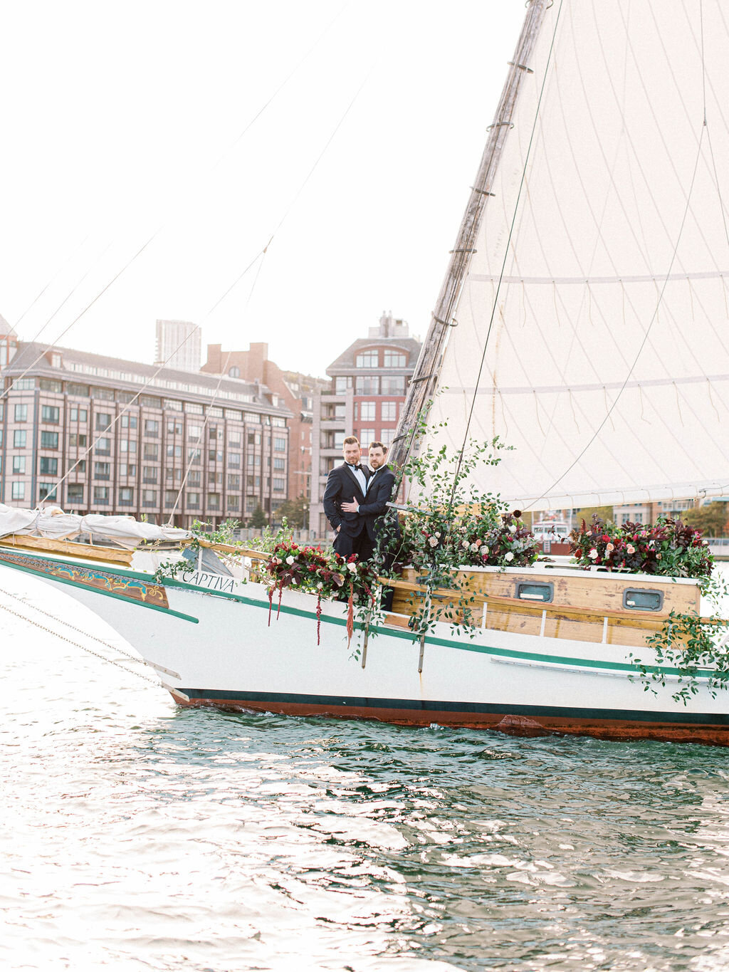 Kate-Murtaugh-Events-Boston-Harbor-sail-boat-yacht-elopement-wedding-planner-moody-florals-grooms-skyline