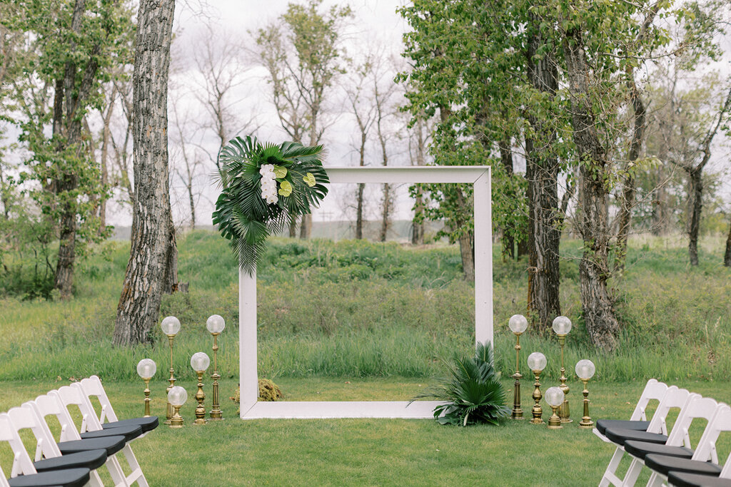 Outdoor ceremony space at Sugar Pine Island, a romantic wedding venue in Foothills, Alberta, featured on the Brontë Bride Vendor Guide.