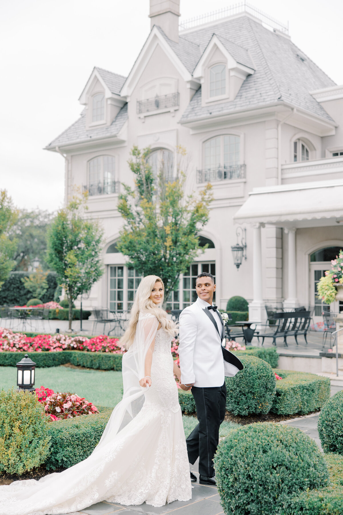 Bride and groom in garden at Park Chateau
