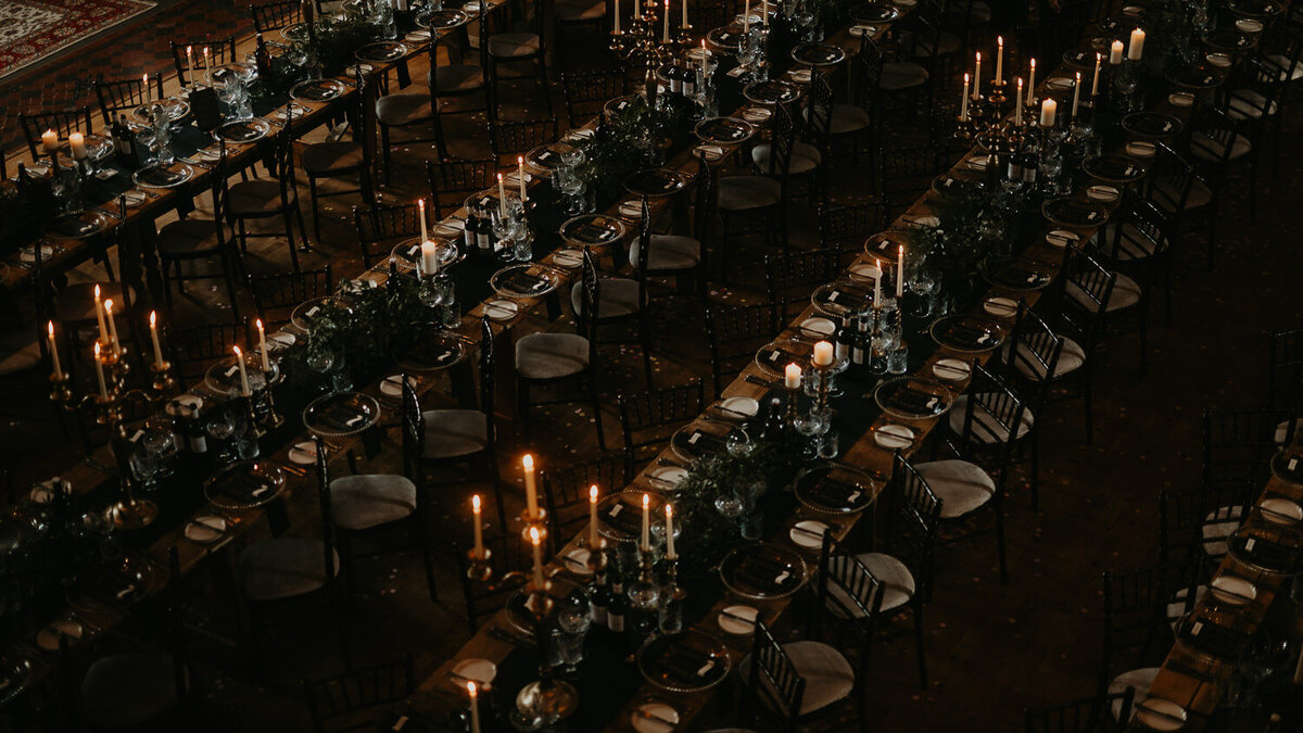 Wedding breakfast set up at The Mount Without with lots of candles. 