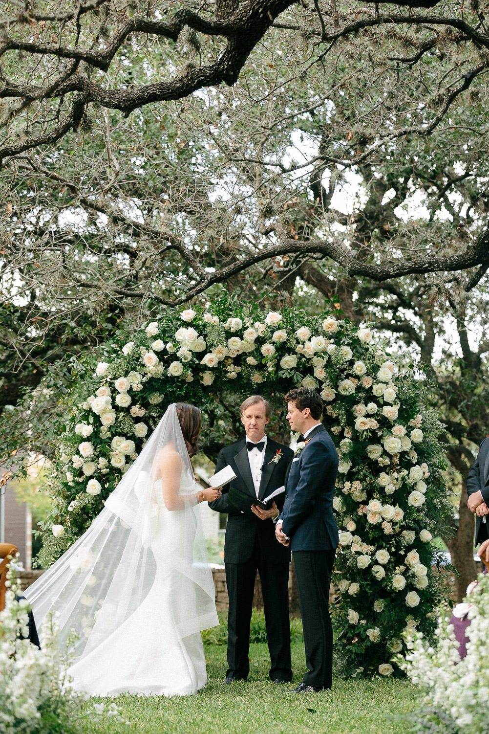 bride reading vows to groom during wedding ceremony altar Matties Austin