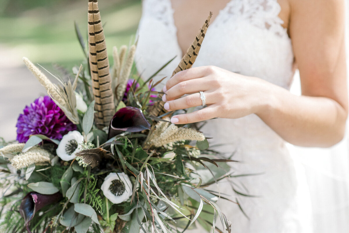 close shot of white and purple wedding bouquet