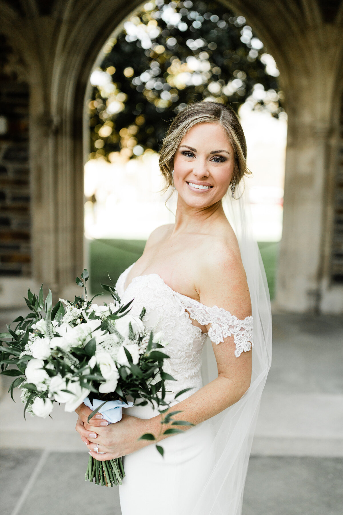 Stunning bridal formal photos with stone arches in the background make this one of our favorite photos.