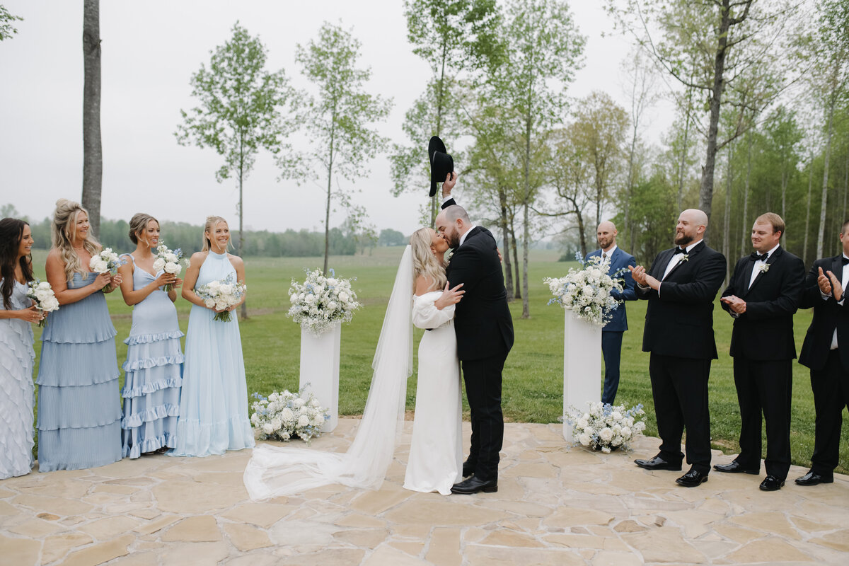 A joyous wedding ceremony sealed with a kiss!