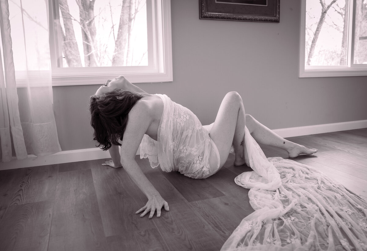 goddess studio boudoir lace implied nude dancer pose windowlight woman black and white simplicity