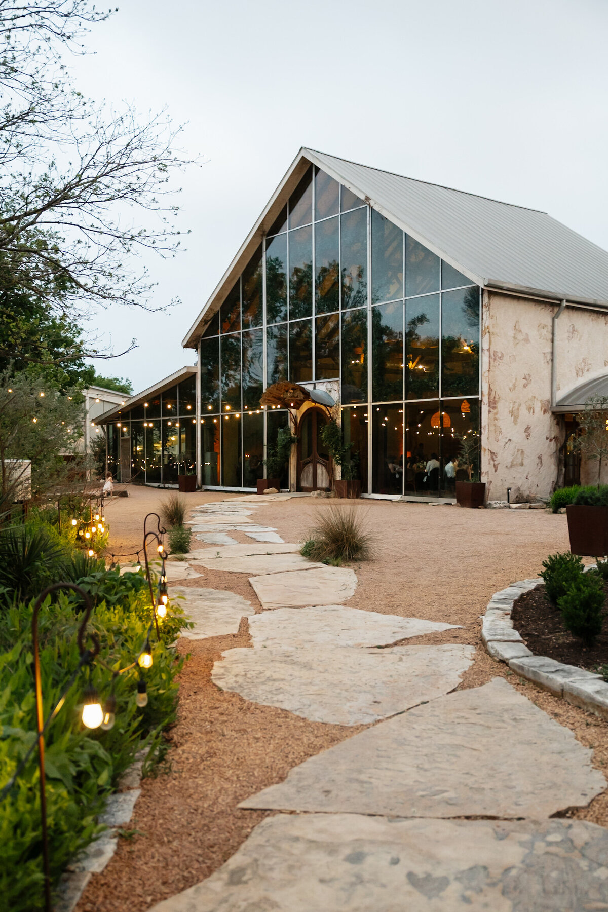 Wedding Photographer takes photo or reception room at Barr Mansion